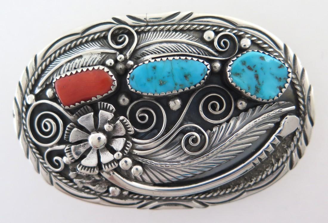 Sterling Silver Turquoise & Coral Ornate Belt Buckle: Title: Sterling Silver Turquoise & Coral Ornate Belt Buckle Description: This awesome vintage sterling silver western belt buckle features turquoise and coral cabochons in serrated bezels and incredib
