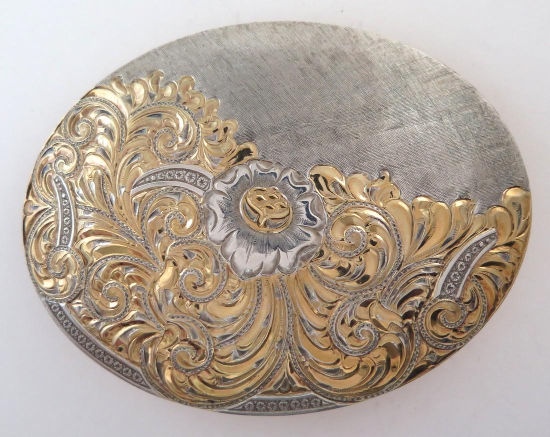 Massive Crumrine 22K Gold Sterling Silver Belt Buckle: Title: Massive Crumrine 22K Gold Sterling Silver Belt Buckle Description: Made by Crumrine Jewelers, this incredible belt buckle is absolutely massive and features a magnificent 22K gold plated floral