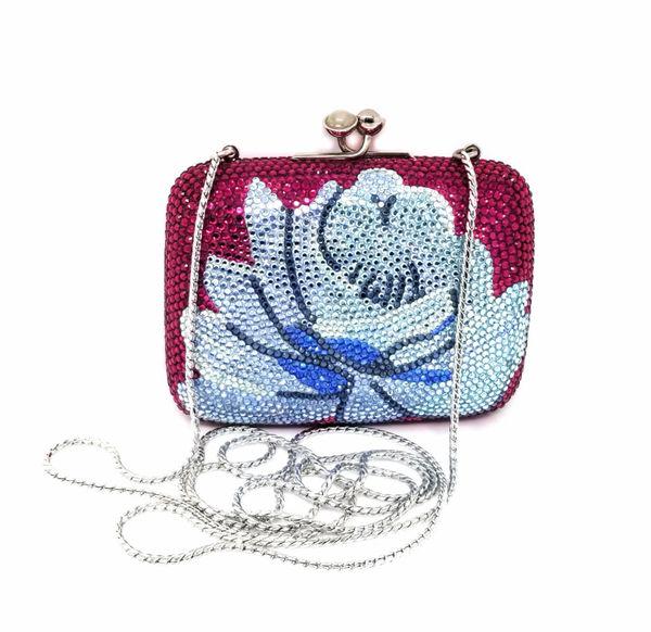 Judith Leiber Crystal Rose Minaudiere Clutch Chain Bag: Judith Leiber Swarovski Magenta Floral Crystal Shoulder Bag Clutch. Highly Collectible and Very Popular. We offer this Judith Leiber floral crystal-embellished Minaudière clutch bag with silver-tone