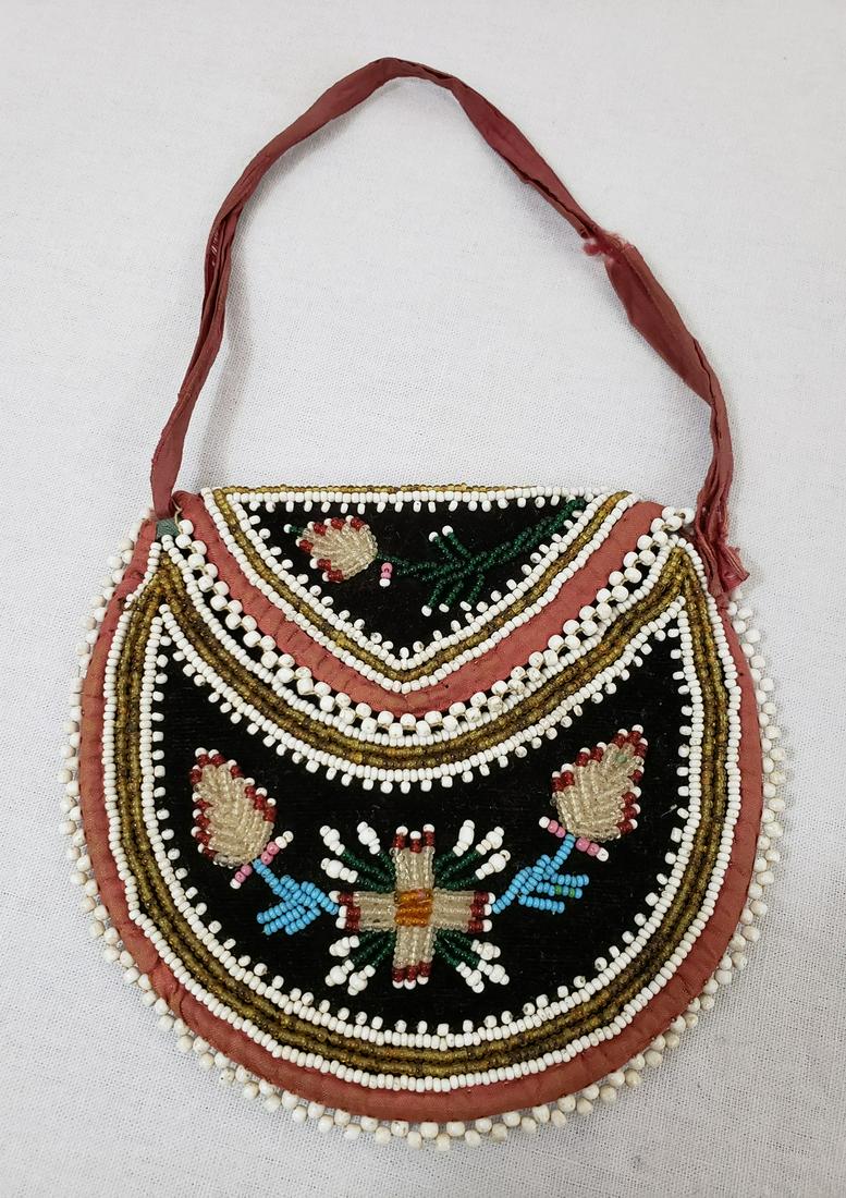 Mic Mac childs beaded bag ca 1840-1860: Title: Mic Mac childs beaded bag ca 1840-1860 Dimensions: 3 3/4" high x 4 1/2" wide Provenance/Additional Info: A charming childs bag in mint condition. Large scale period gingham liner and red silk s