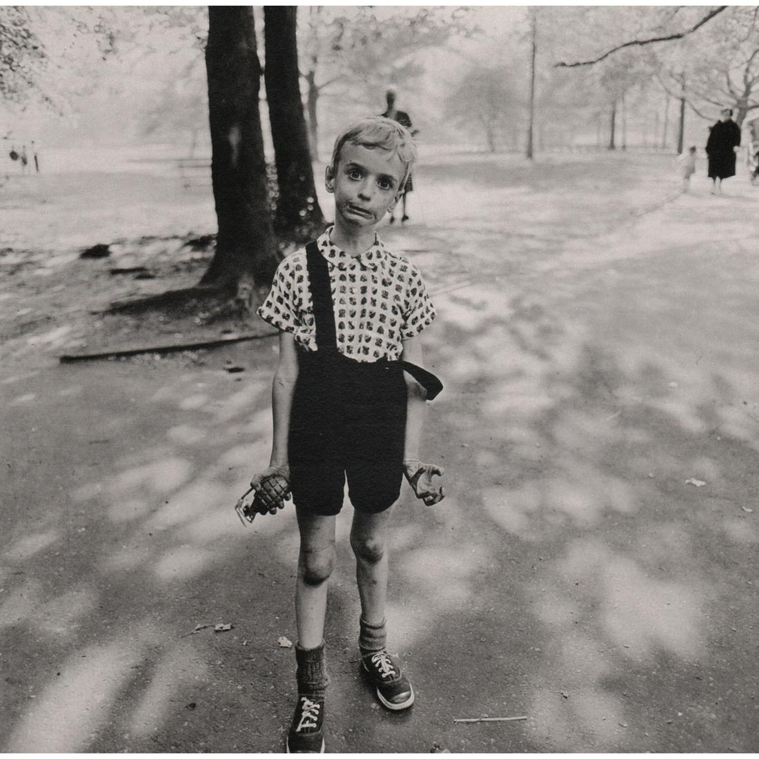 DIANE ARBUS - Child with Toy Hand Grenade, 1962: Artist: DIANE ARBUS Print Title: Child with Toy Hand Grenade in Central Park, 1962 Limited Edition folio 563/1000 Medium: Sheet-Fed Gravure Printed in 1979 Printed in Italy Image Size: 9.75 x 10 inche