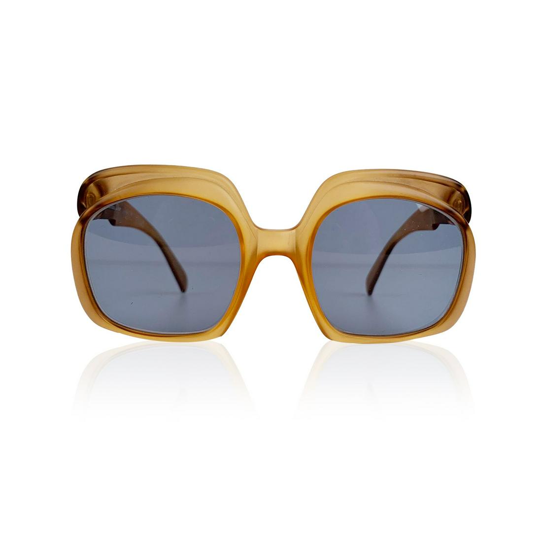 Christian Dior Vintage Optyl Oversize Women Mint 1970s: Original vintage oversized sunglasses from the late 1970s. Frame made in France. Honey Brown color frame with "CD" silver metal initials on the side. Original frame with new light blue lens (CR39 - 10