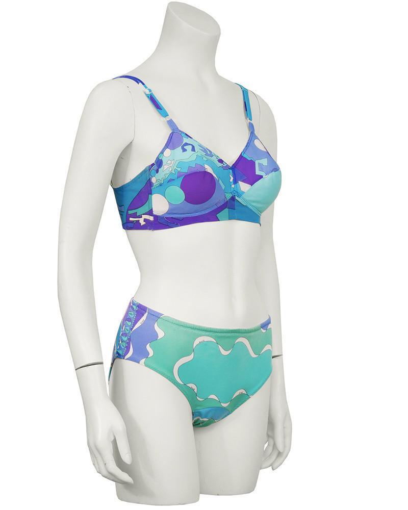 Emilio Pucci Blue and Green Formfit Rogers Underwear: 1970's Emilio Pucci nylon bra and underwear. The brassiere features a blue/green/purple geometric print with adjustable straps, padded cups and lycra mesh siding. Closes with a 2 hook adjustable closu