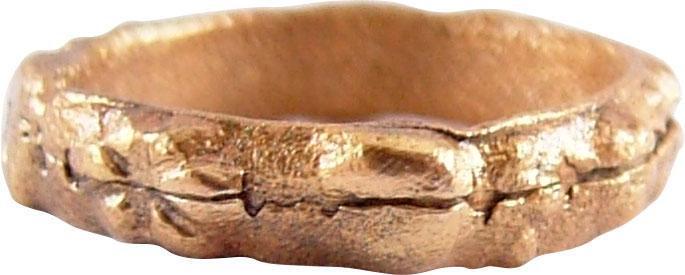FINE AND RARE VIKING WARRIOR: 9th-11th century AD. Heavy rounded face ring, over 1/2Â” inside diameter. Broad (3.2mm) rounded face with a medial line, decorated with a series of various flower and floral displays. The use of be