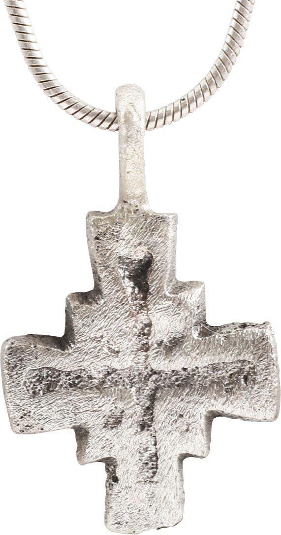MEDIEVAL PEASANT’S CHRISTIAN CROSS 9th-12th CENTURY: The period of the spread of Christianity throughout Europe. Silvered bronze, just under 1” height with cross beam centered and a square at the beam junction. Flat face with a simple incised cross wi