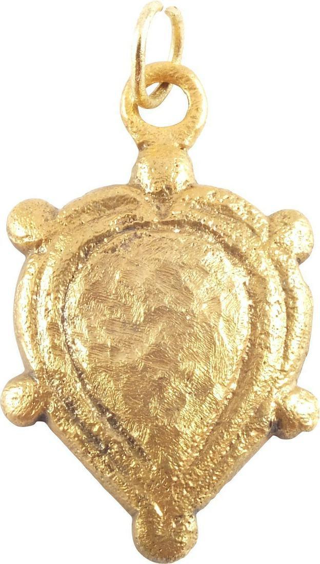 VIKING HEART PENDANT NECKLACE 11th CENTURY AD JEWELRY: Just over 5/8” width. Heart form with nubbed quarter points. Raised borders of cusped heart form enclosing a naturalistic heart. Both forms are used profusely in Nordic literature. The heart stood f