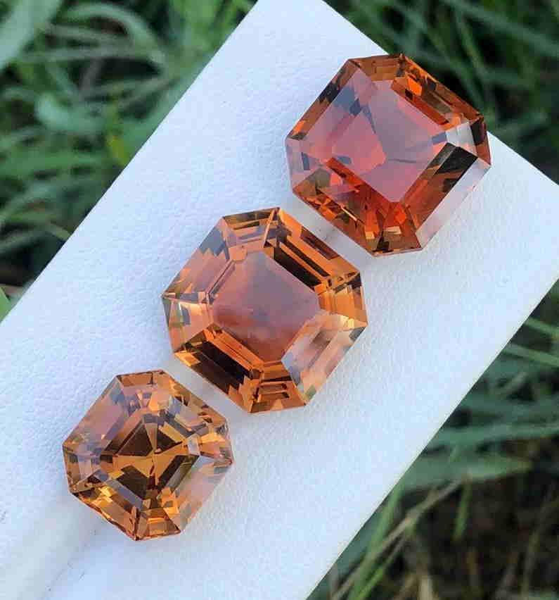 51 Carats Beautiful Assher Cut Topaz: Title: 51 Carats Beautiful Assher Cut Topaz Origin: Pakistan Gemstones: Topaz Carat Weights: 51 Carats Size/Dimensions: 3 Pieces Additional Information: Heated Reserve: $250.00 Shipping: Domestic