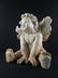 A large sculpture of a Cherub