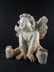 A large sculpture of a Cherub - 2
