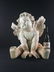 A large sculpture of a Cherub - 8