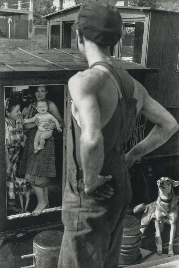 Henri Cartier-Bresson, Family On Houseboat, 1956: Artist: Henri Cartier-Bresson Title: Family On Houseboat, 1956 Medium: Photo Litho, 2000, Italy Dimensions: 5.7x8.5" Additional Information: Heat Wax Mounted on 8.5x11" Conservation Board Artist Bio: 