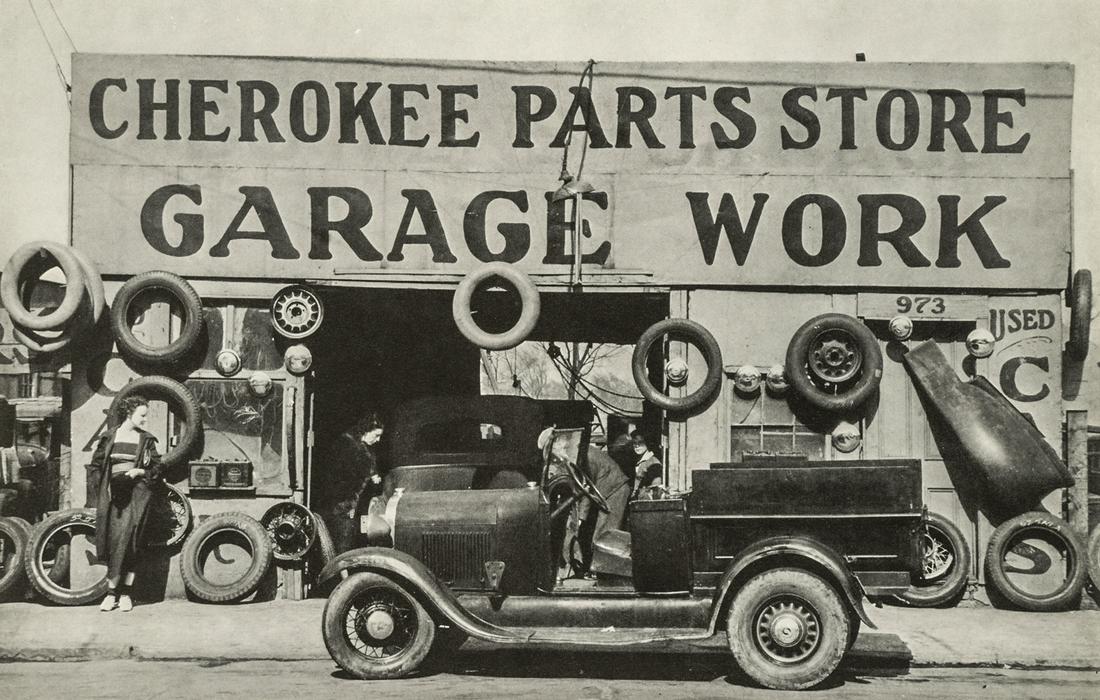 Walker Evans, Garage, Southern City Outskirts, 1936: Artist: Walker Evans Title: Garage, Southern City Outskirts, 1936 Medium: Photo Litho, 1975, USA Dimensions: 7.1x4.5" Additional Information: Heat Wax Mounted on 8.5x11" Conservation Board Artist Bio: