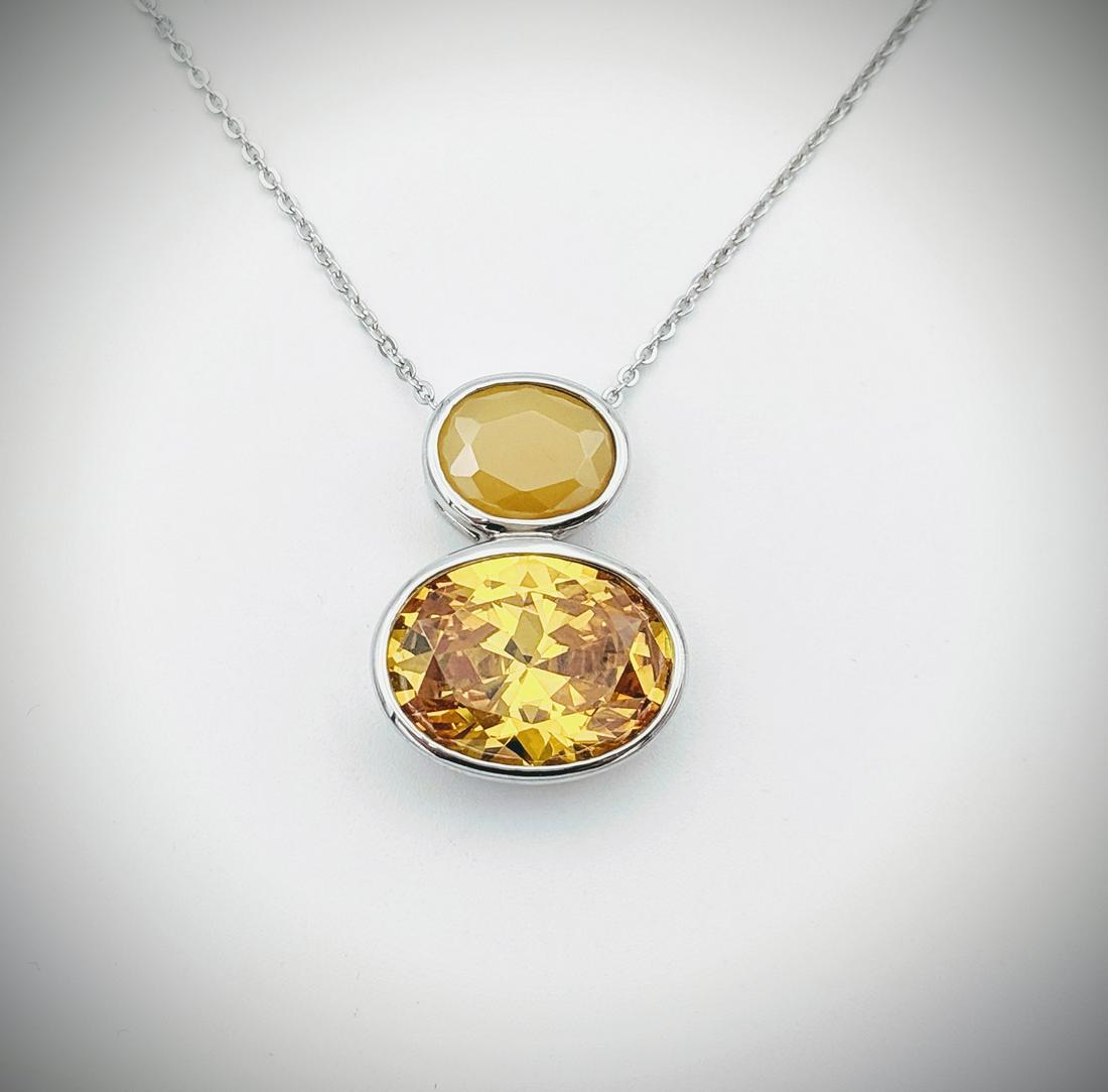 Sterling Silver Necklace w Citrine & Yellow Jadeite: Title: Sterling Silver Necklace w Citrine & Yellow Jadeite Pendant Brand: Jean Lin Collection Metal Purity: 925 Sterling Silver Gemstones: Citrine & Yellow Jadeite Carat Weights: Pendant has 1 Oval Ci
