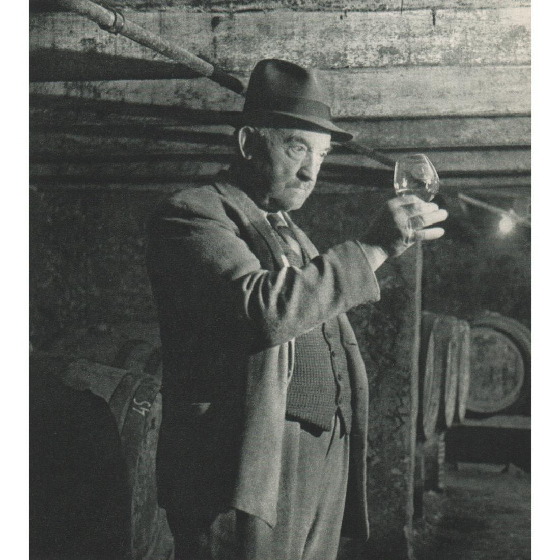 ROBERT DOISNEAU - Wine Tasting in Paris: No Reserve! Artist: ROBERT DOISNEAU Print Title: Wine Tasting in Paris Medium: Sheet-fed Gravure Printing Date: 1950's Printed in France Image Size approx: 5.25 x 4.75 inches Robert Doisneau (1912-199