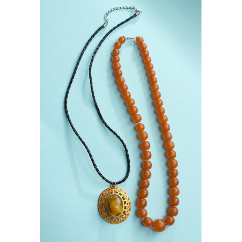 51 g. butterscotch 100% natural Baltic amber set of: Total weight: 51 gram Necklace weight: 35 gram Beads size: 9-15 mm Circum.lenght: 480 mm Pendant weight: 16 gram (weight with cord) Size: 17x38x48 mm Circum.lenght: 540 mm (Adjustable size) Stone: 100