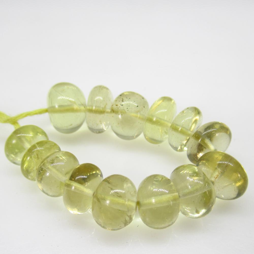 31.91 Ct Natural 14 Lemon Quartz Round Beads: No Reserve! Title: 31.91 Ct Natural 14 Lemon Quartz Round Beads Stone Clarity: Transparent Gemstones: Natural Lemon Quartz Beads Carat Weights: 44.14 Size/Dimensions: 7.20 to 8.20 mm / 14 PC's Additio