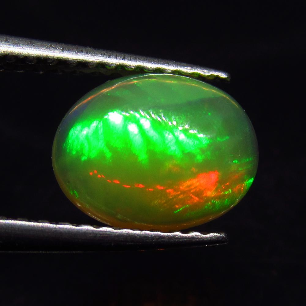 1.17 Ct Natural  Ethiopian Multi-Color Fire Opal Oval (1 of 2)