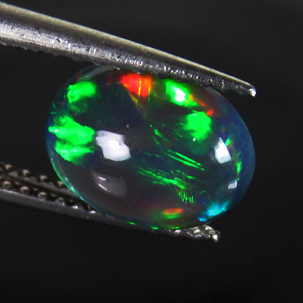 1.25 Ct Natural Ethiopian Multi-Color Fire Opal Oval (1 of 2)