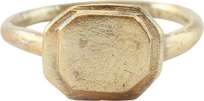 MEDIEVAL EUROPEAN RING, 11th-13th CENTURY: 11th-13th century. Size 5 1/2 with deeply rounded face tapered band flaring slightly to the shoulders. Elongated stepped octagonal bezel. Professionally refurbished with the 24karat gold surface resto