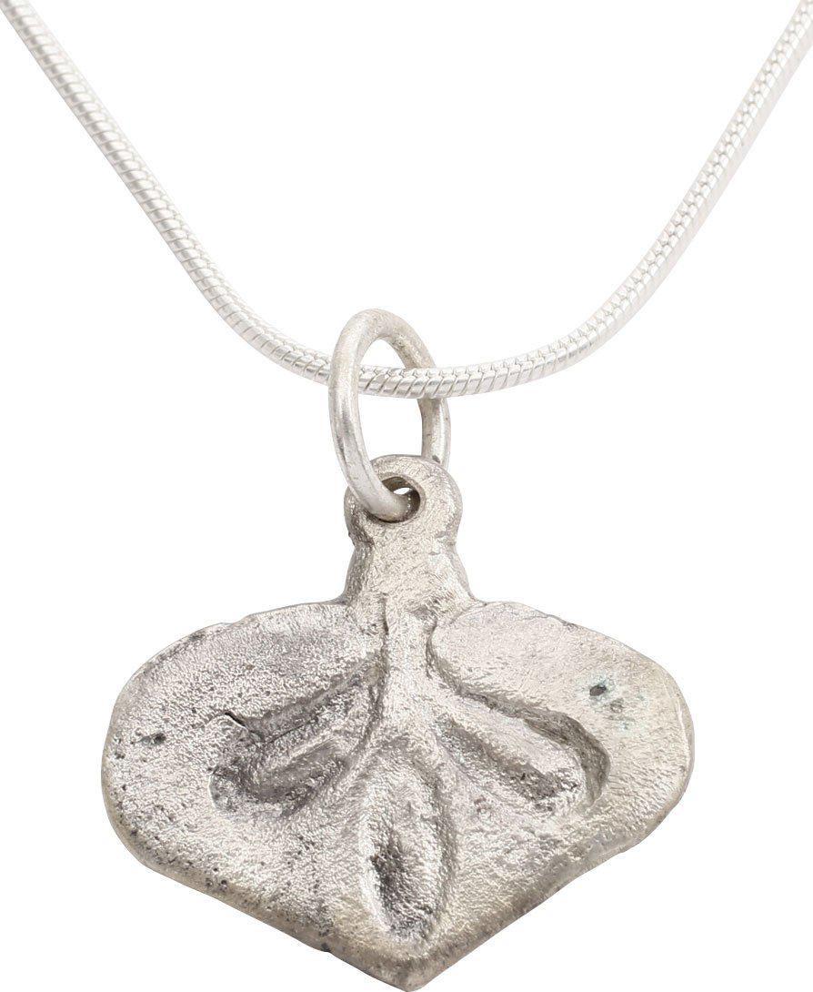 CLASSIC VIKING HEART NECKLACE PENDANT 9th-10th CENT AD: 3/4Â” height including the loop, of elegant form. Broad heart with rounded edge, incised with a trefoil. Made by the open face mold process. The foliate trefoil was a very popular motif for Viking 