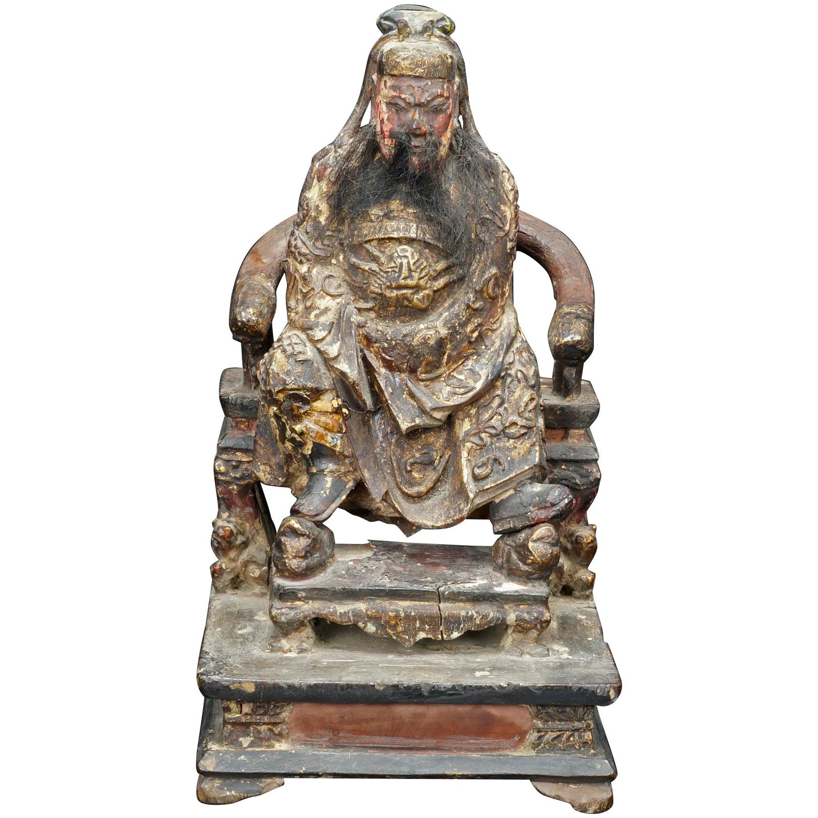 18th c Chinese Wood Figure of Guan Yu: A very old carved wood and lacquer figure of Guan Yu Daoist God of War sitting on a throne. The figure was carved from a heavy dense wood. It was then covered in a gesso and coated in colored lacquers