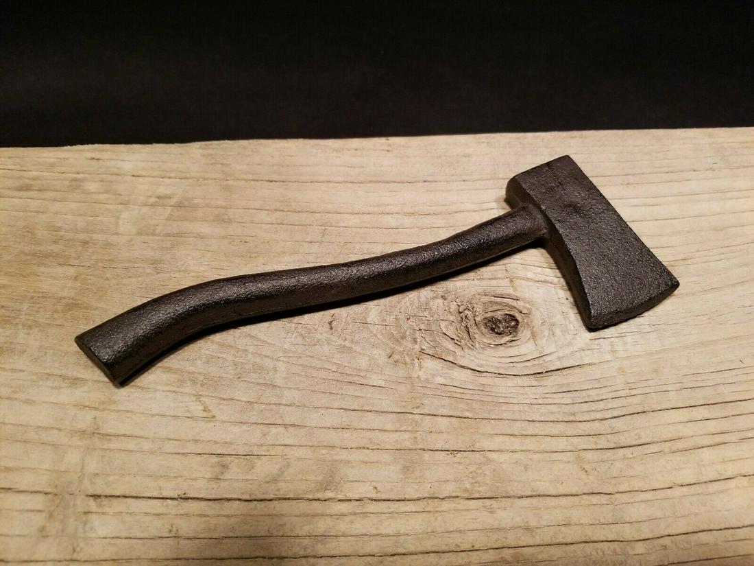 Cast Iron Axe Hatchet Paperweight: 8" long x 2 5/8" wide Well made reproduction antique cast iron axe paperweight Reserve: $10.00 Shipping: Domestic: Flat-rate of $8.00 to anywhere within the contiguous U.S. International: Foreign ship