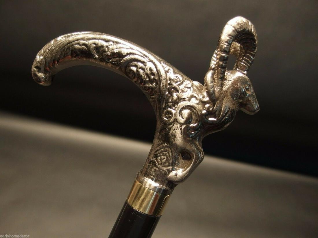 Ram Goat Metal Walking Stick Cane: Vintage Antique Style, Brass, Wood Victorian Walking Stick Cane Description 36" Long,.. Handle is 6" Long Wonderful reproduction walking cane, cast from an original. The handle is all heavy solid meta