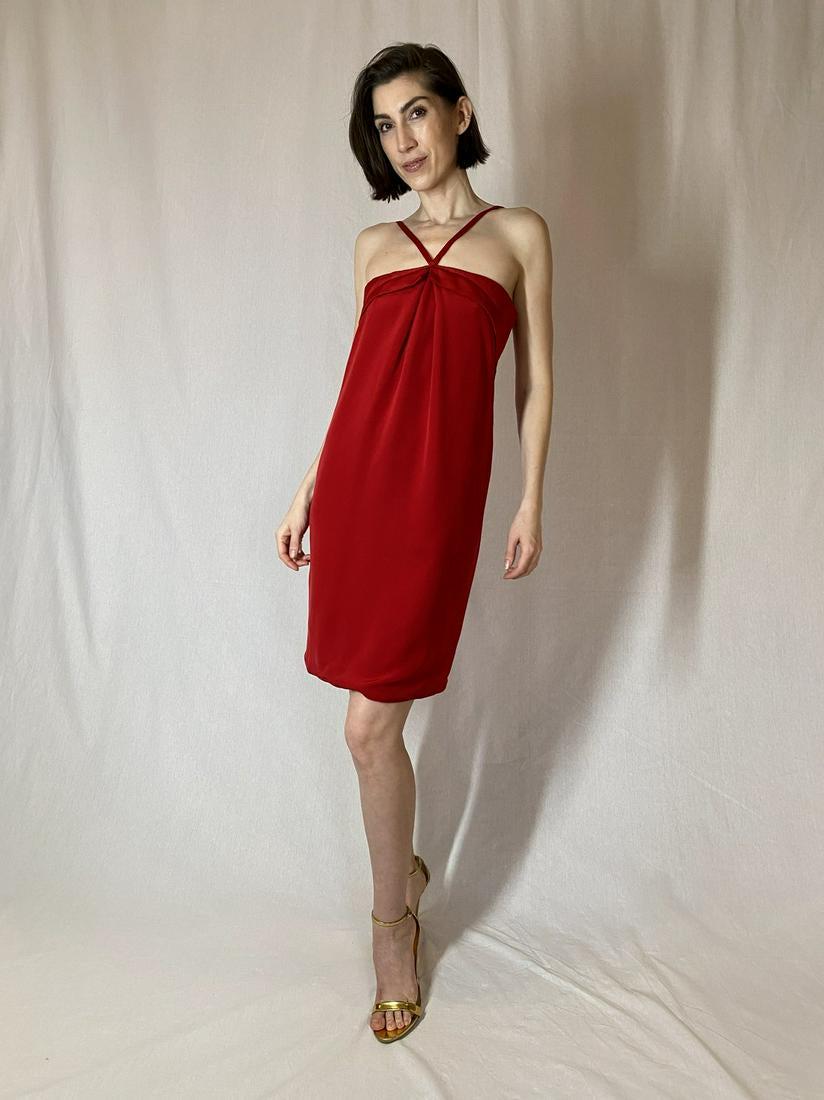 Geoffrey Beene Red Silk Dress: GEOFFREY BEENE EARLY 90s KNEE-LENGTH RED DRESS WITH "V" STRAPS AND FOLD-OVER DETAIL AT BUST THAT FINISHES AT SIDE BACK. LITTLE TAG AT FRONT THAT SAYS "FRONT". NICELY CONSTRUCTED, EVEN LINING HAS DARTS