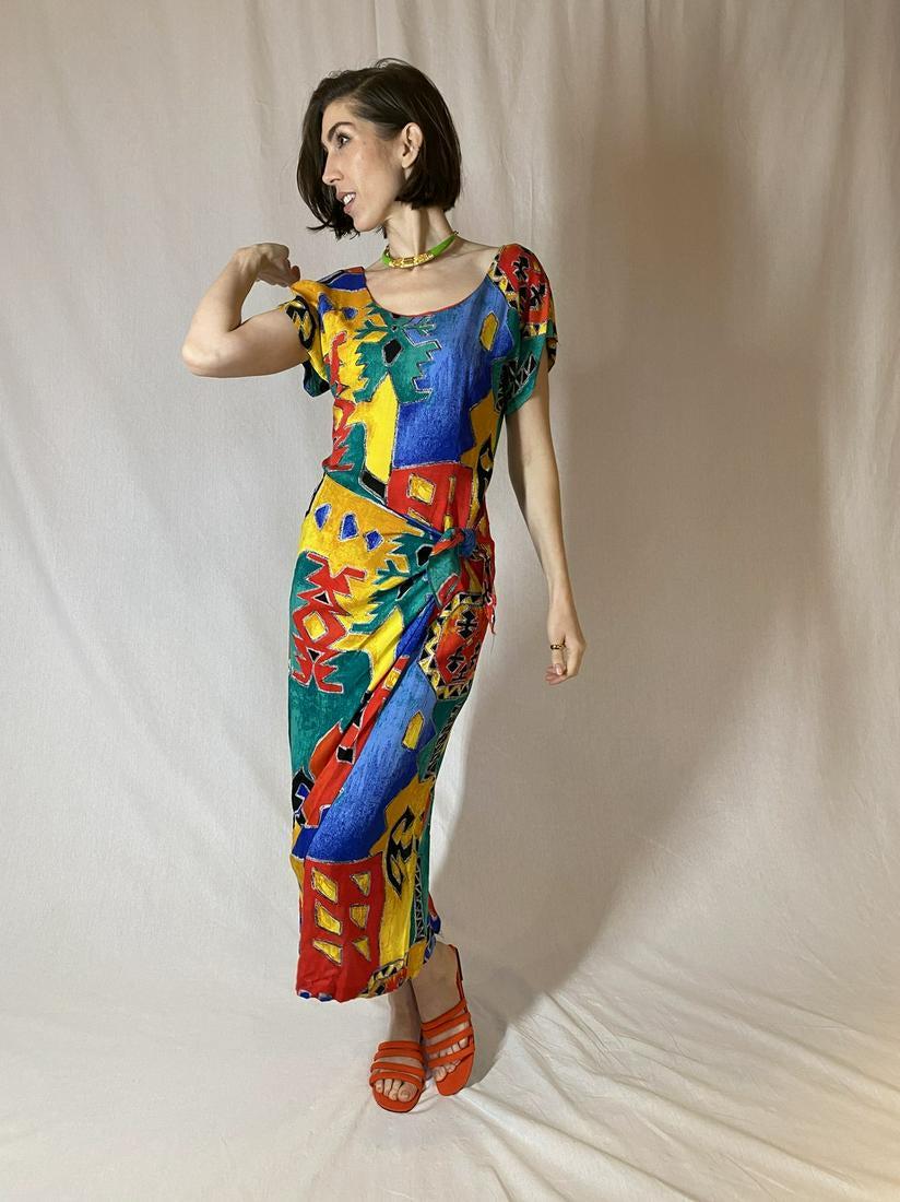 80s "Santa Fe-print" dress with "sarong" detail: JUST MAGGIE 1980s BRIGHT, SANTA-FE-STYLE BLUE/RED/YELLOW/GREEN/BLACK PRINT DRESS WITH SARONG-WRAP DETAIL. FEELS LIKE COTTON, MARKED SIZE 9/10 Brand: JUST MAGGIE Materials: 100% RAYON Size: S-M Waist: 