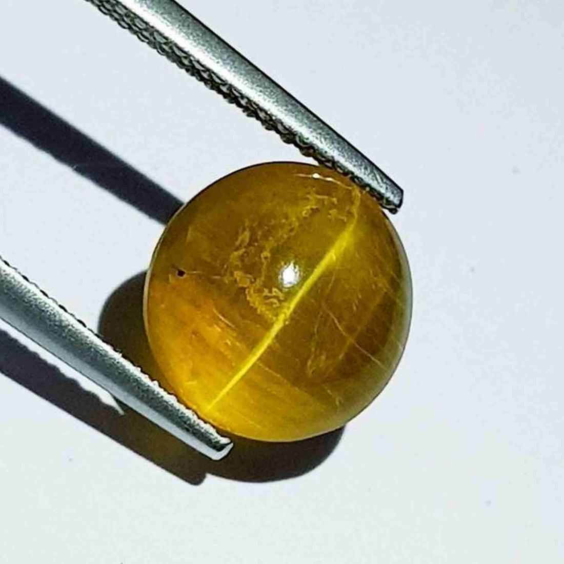 3.48 ct Natural Opal Cat's Eye: No Reserve! Title: 3.48 ct Natural Opal Cat's Eye Color/Clarity: Semi Transparent Type: Loosegemstone Carat Weight: 3.48 Dimensions: 10.30 x 9.80 x 6.10 Additional Information: Oval - Africa Shipping: