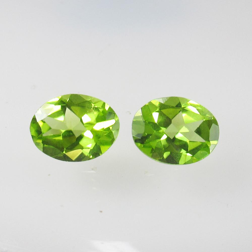 3.18 Ct Natural Pakistan Peridot Oval Pair: No Reserve! Title: 3.18 Ct Natural Pakistan Peridot Oval Pair Stone Clarity: VVS Gemstone: Natural Peridot Carat Weight: 3.18 Size/Dimensions: 8.80 x 7.00 x 4.00 mm / 2 PC's Additional Information: To