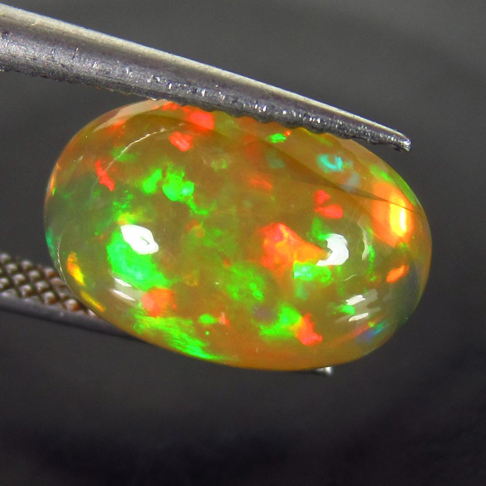 3.55 Ct Natural  Ethiopian Multi-Color Fire Opal Oval (1 of 2)