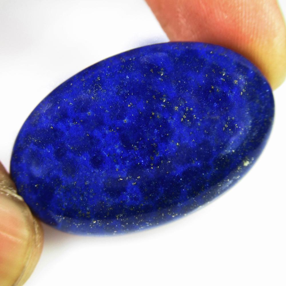 49.35 Ct Natural Blue Lapis Lazuli 35X23 mm Oval Cab: No Reserve! Title: 49.35 Ct Natural Blue Lapis Lazuli 35X23 mm Oval Cab Stone Clarity: Opaque Gemstone: Natural Lapis Lazuli Carat Weight: 49.35 Size/Dimensions: 35.00 x 23.00 x 7.00 mm Additional Inf