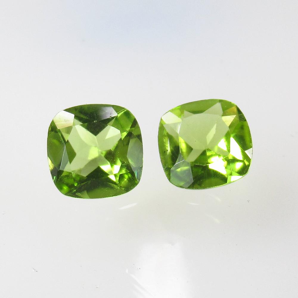 2.68 Ct Natural Pakistan Peridot Cushion Pair: No Reserve! Title: 2.68 Ct Natural Pakistan Peridot Cushion Pair Stone Clarity: VVS Gemstone: Natural Peridot Carat Weight: 2.68 Size/Dimensions: 6.90 x 6.90 x 4.00 mm / 2 PC's Additional Information: