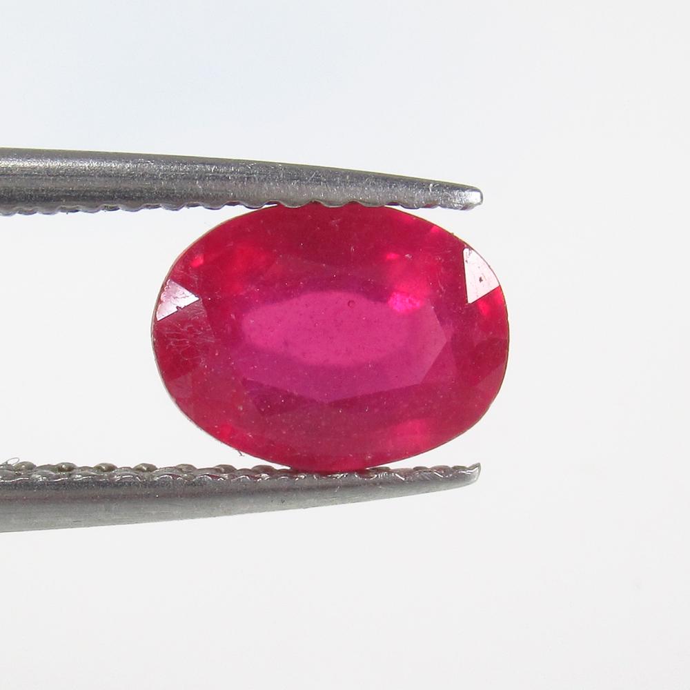1.29 Ct Natural Mozambique Pinkish Red Ruby Oval Cut (1 of 2)