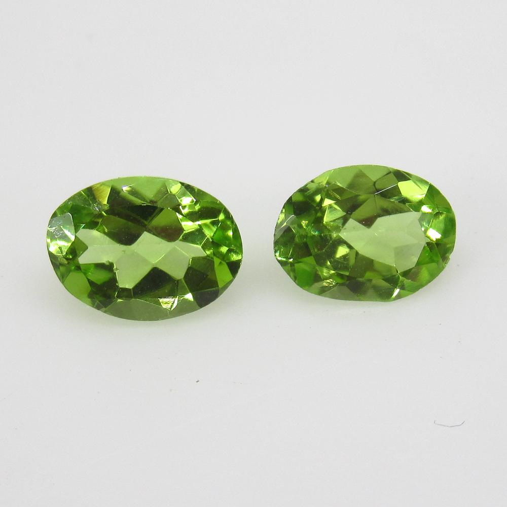 2.19 Ct Natural Pakistan Peridot Oval Pair: No Reserve! Title: 2.19 Ct Natural Pakistan Peridot Oval Pair Stone Clarity: VVS Gemstone: Natural Peridot Carat Weight: 2.19 Size/Dimensions: 7.90 x 5.90 x 3.70 mm / 2 PC's Additional Information: To