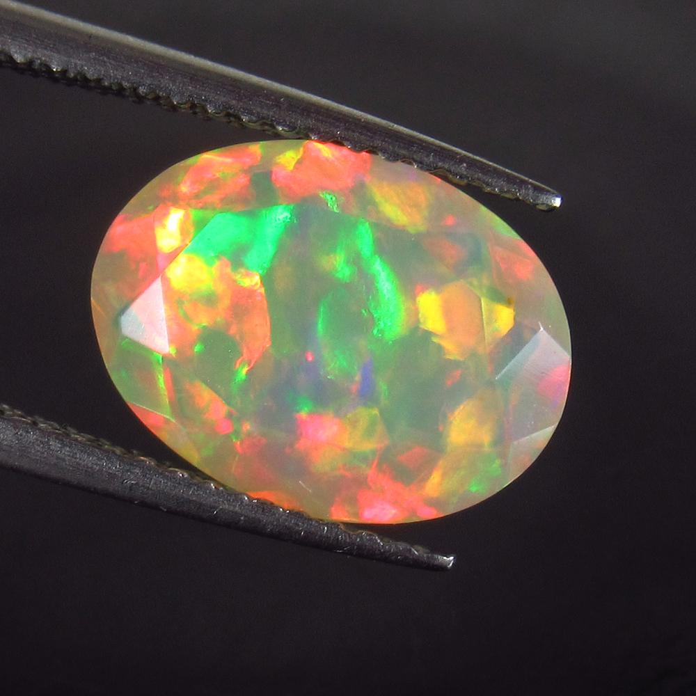 2.08 Ct Natural Multi-Color Fire Faceted Opal Oval Cut (1 of 2)