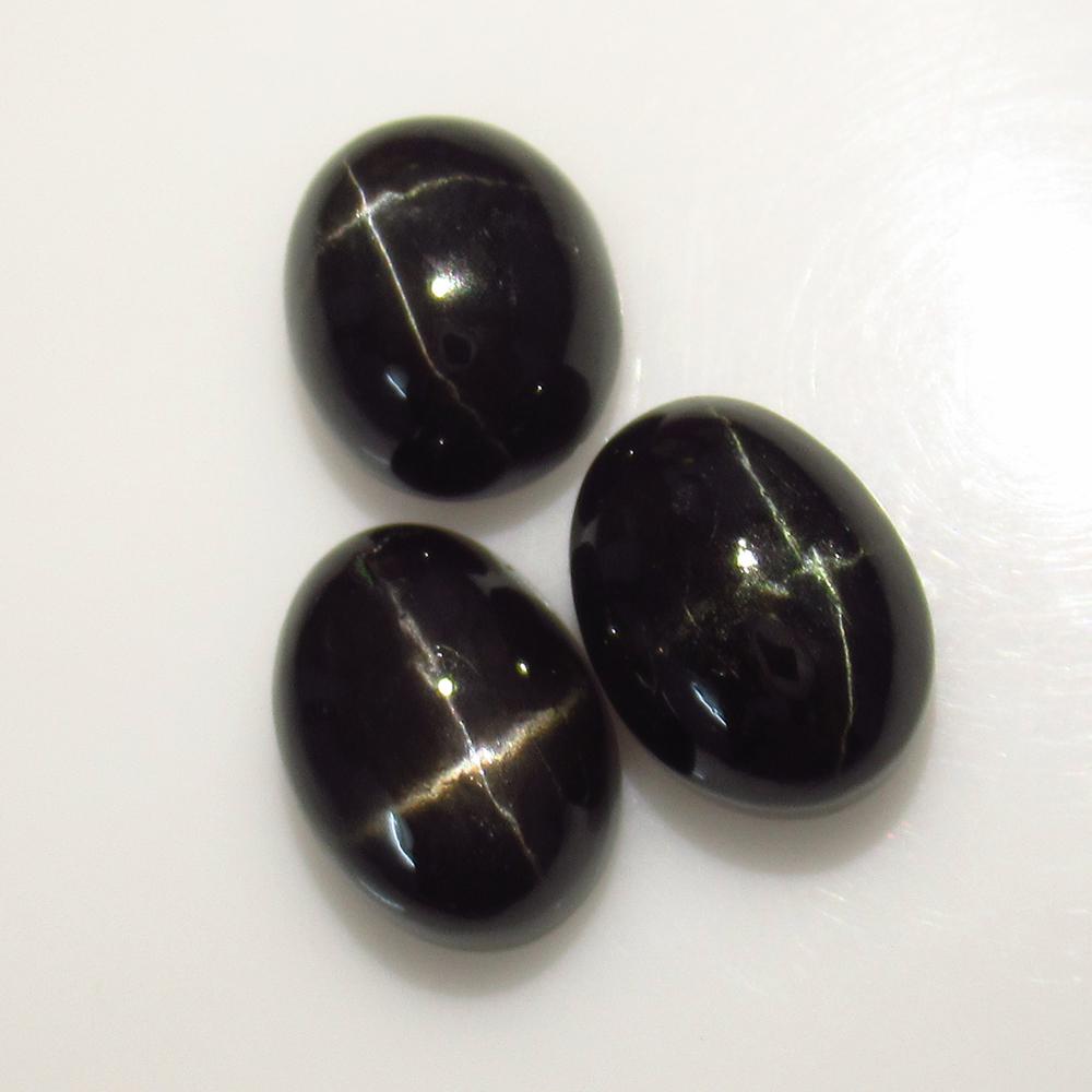 28.40 Ct Natural 3 Black Diopside Catseye Oval Set (1 of 2)