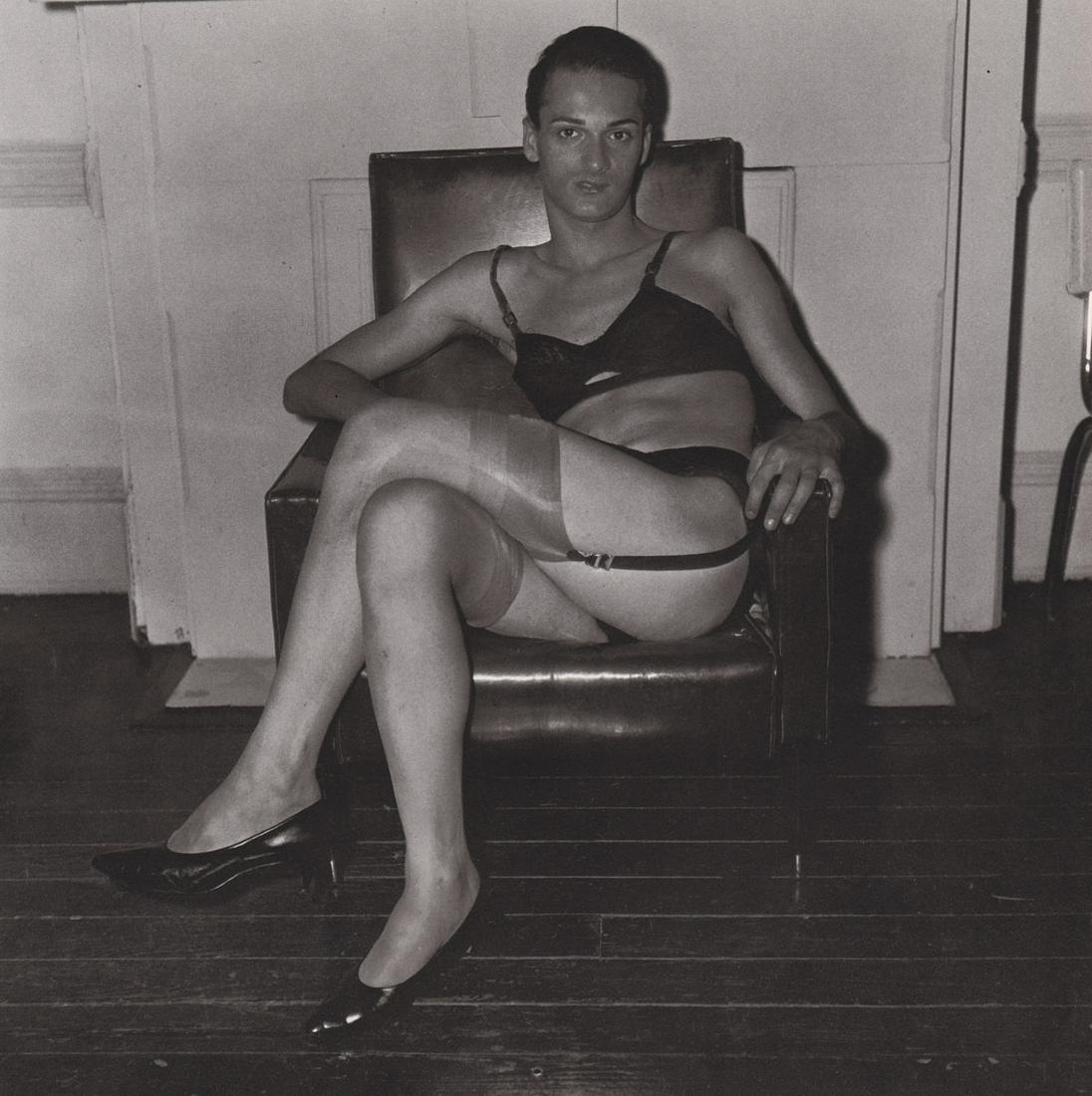 DIANE ARBUS - Seated Man in a bra and stockings, NYC,: Artist: DIANE ARBUS Print Title: Seated Man in a bra and stockings, NYC, 1967 Medium: Photoengraving Printed 1970’s in the US Image size (inches) approx. 8 x 8.5” Diane Arbus (1923 –1971),was an