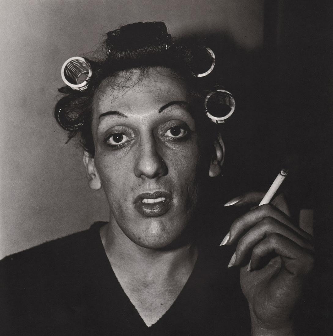 DIANE ARBUS - Young Man in curlers at home on West 20th: Artist: DIANE ARBUS Print Title: Young Man in curlers at home on West 20th St, NYC, 1966 Medium: Photoengraving Printed 1970’s in the US Image size (inches) approx. 8 x 8” Diane Arbus (1923 –197