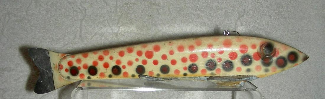 Spotted Ice Fishing Lure Decoy: Title: Spotted Ice Fishing Lure Decoy Provenance/Additional Info: A very colorful wooden fishing lure or fish decoy with molded metal fins and a tin tail. The lure is decorated with orange and blue (b