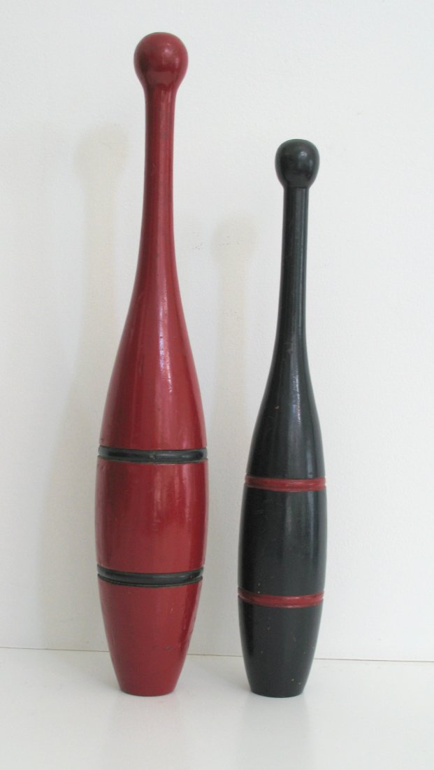 Two vintage painted Indian clubs. (1 of 3)
