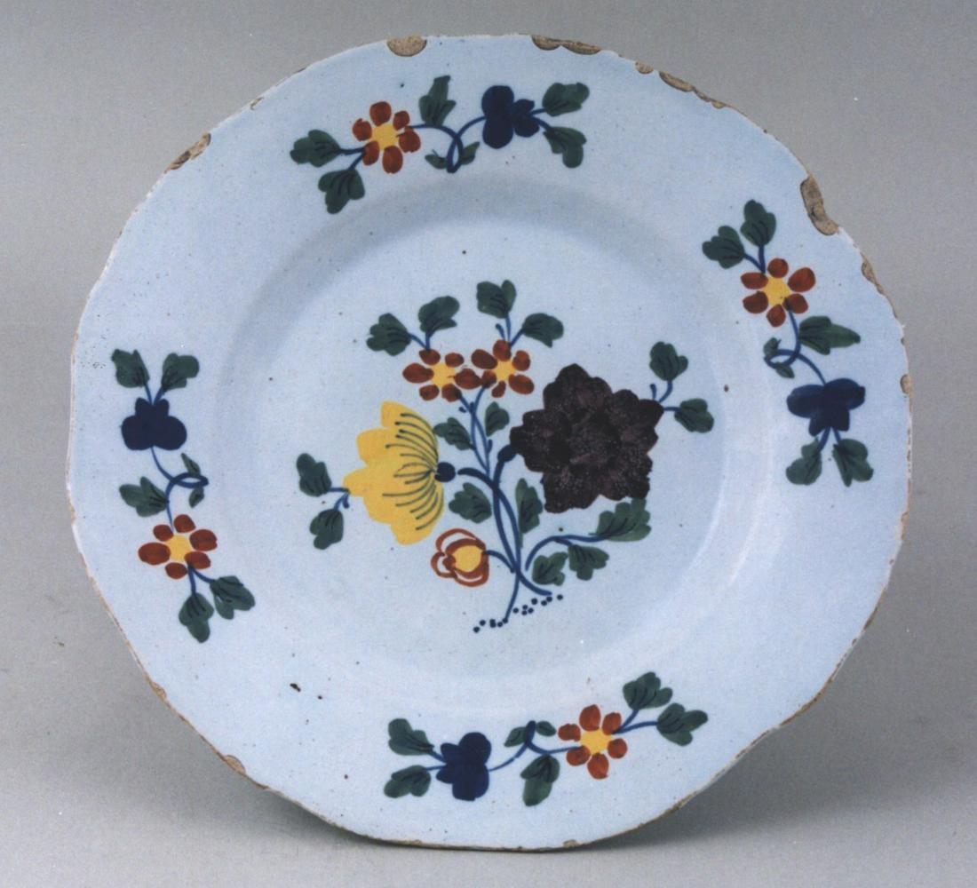 A primitive fazakerley style plate with wavy edge: Title: A primitive fazakerley style plate with wavy edge Date: c. 1760 Dimension: Size: 9 1/16" Provenance/Additional Info: Shipping: Domestic: Flat-rate of $25.00 to anywhere within the contiguous U.