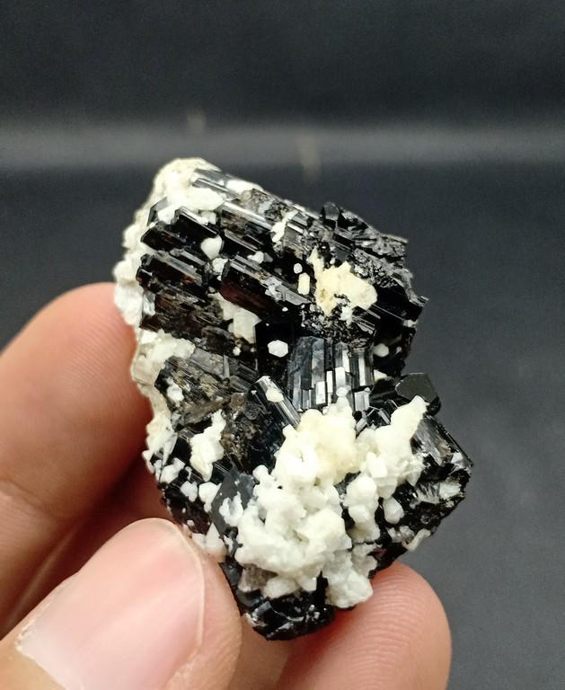 22 Gram Beautiful Black Tourmaline With Mica & Quartz: Title: 22 Gram Beautiful Black Tourmaline With Mica & Quartz Specimen Treatment: Natural Gemstones: Tourmaline With MIca & Quartz Weight: 22 Gram Size/Dimensions: 40x28x16 mm Origin: Pakistan Reserve: