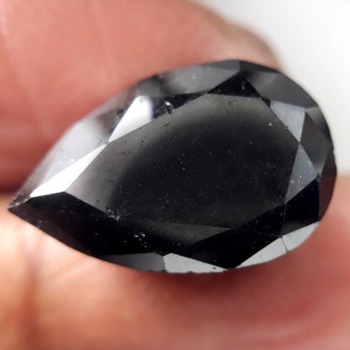 8.42 Cts Natural Black Diamond: Title: 8.42 Cts Natural Black Diamond Color/Clarity: Black/VS Gemstone Type: Diamond Carat Weights: 8.42 Cts Size/Dimensions: 17.02 x 11.11 x H6.87 mm Reserve: $750.00 Shipping: Domestic: Flat-rate of