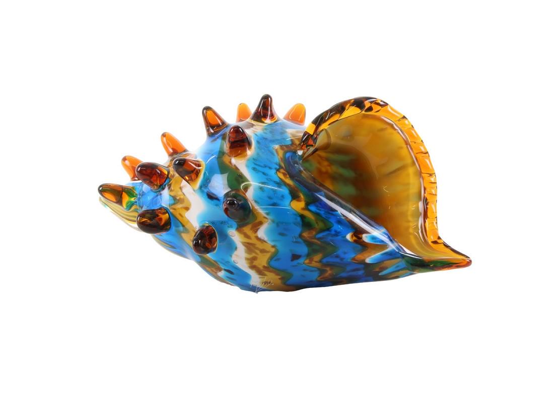 A murano glass conch shell - Tropical beach decor: Title: A murano glass conch shell - Tropical beach decor Maker: unknown Origin: Italy Date/Period: 2nd half 20th century Materials:Glass Dimensions:Height: 14.4 cm / 6 inchesWidth: 18.8 cm / 7.2 inche