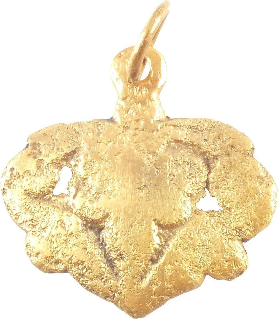 RARE VIKING HEART NECKLACE PENDANT C.1000 AD JEWELRY: A good example in its fully evolved form. Broad representation with central pierced trefoil sprouting from the foliate edges at the cusp. About ¾” width, made by the open face mold technique. The i