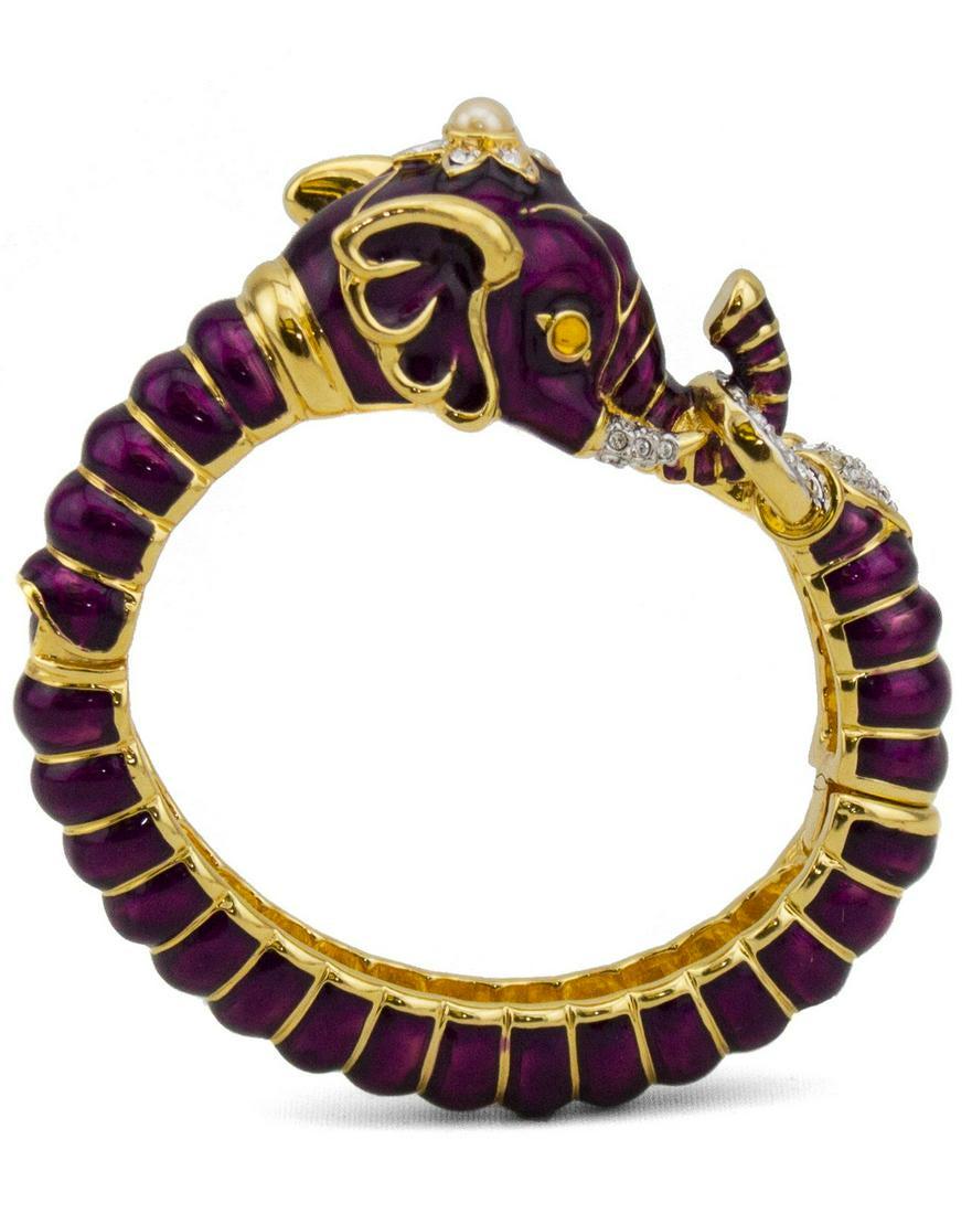 Kenneth Jay Lane Purple Enamel and Rhinestone Elephant: Gorgeous KJL purple enamel and gold elephant shaped clamper bracelet with rhinestone and pearl accent. This bracelet was produced in at least 6 different colors between the 1980s and the 1990s. The el