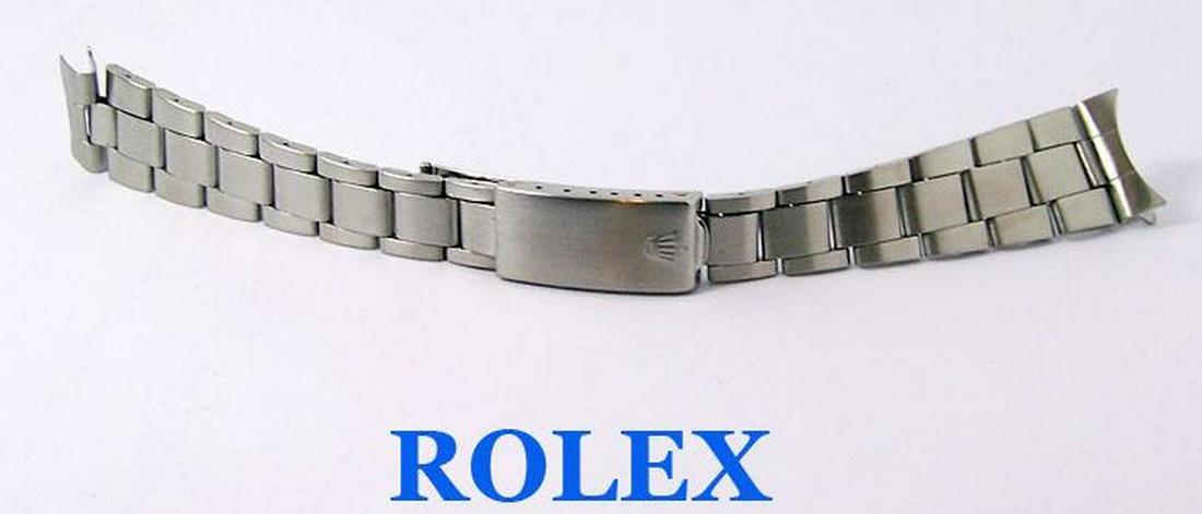 Original 7835 ROLEX 19 mm 1970s Oyster S/Steel: Description Authentic Vintage Original 7835 ROLEX 19mm c.1970 Oyster S/Steel Bracelet* 257 End links in Excellent Condition This Men's Rolex watch bracelet is Swiss made. Great present for yourself or