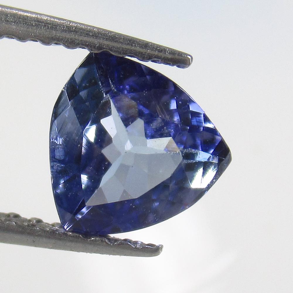 0.92 Ct Natural Tanzanite Trillion Cut: Reserve: Title: 0.92 Ct Natural Tanzanite Trillion Cut Stone Clarity: VVS Gemstone: Natural Tanzanite Carat Weight: 0.92 Size/Dimensions: 6.50 x 6.40 x 3.20 mm Additional Information: Top Quality Lust